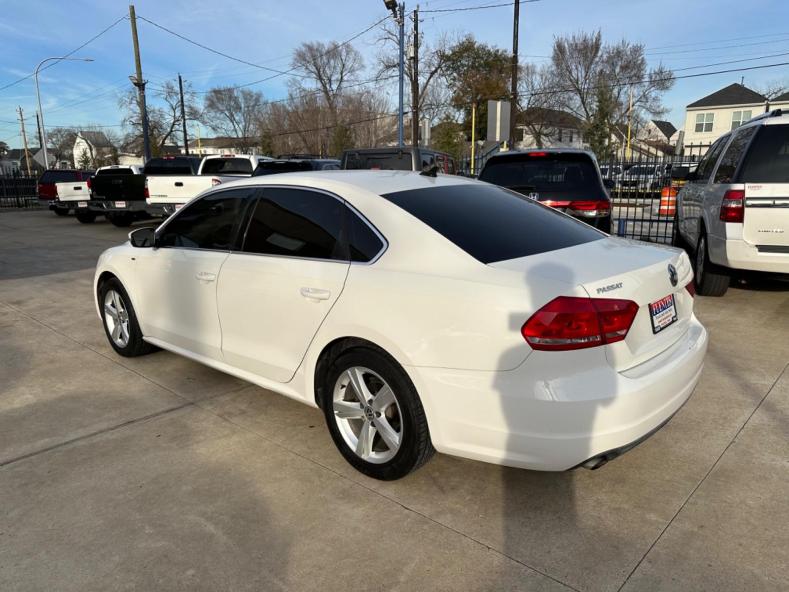 2014 White /Black Volkswagen Passat 1.8T S AT (1VWAS7A34EC) with an 1.8L L4 TURBO DIESEL engine, 6-Speed Automatic transmission, located at 1501 West 15th St., Houston, 77008, (713) 869-2925, 29.797941, -95.411789 - Photo #3